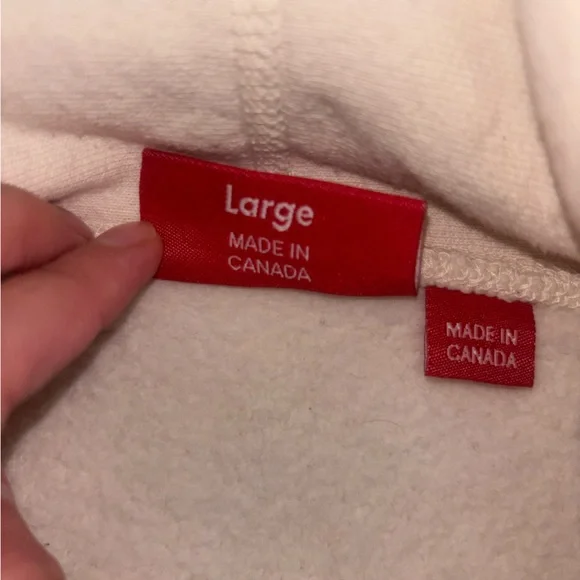 Supreme Cream Hoodie with Red Tag